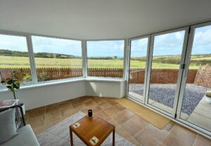 Interior of a solid conservatory roof with a SupaLite system, offering enhanced insulation and comfort in South Wales.