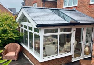 Elegant solid tiled conservatory roof with modern insulation, enhancing comfort and energy efficiency.