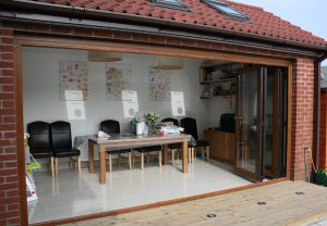 Bifold doors with timber effect uPVC