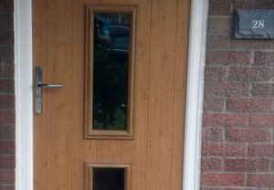 Brown composite entrance door